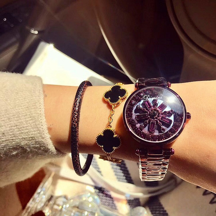 Montre d'ambiance en or rose avec coque et diamants