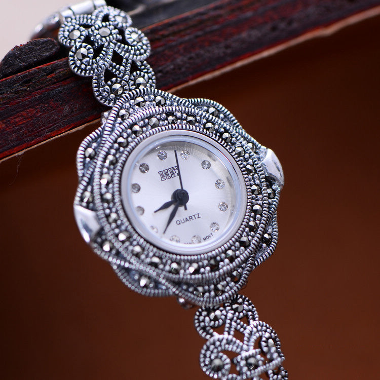 Reloj tailandés plateado para mujer