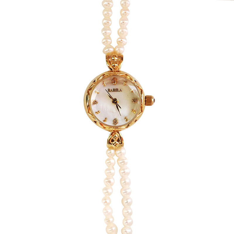 Montre pour femme avec bracelet en perles d'eau douce naturelles et rouge net