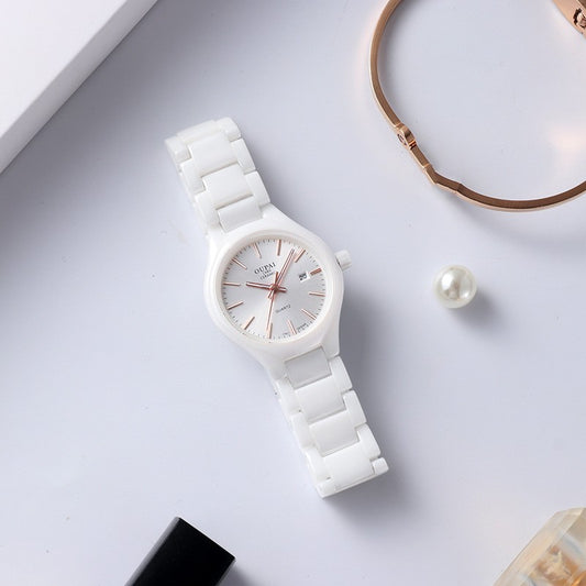 Reloj de mujer de cerámica blanca con temperamento simple.