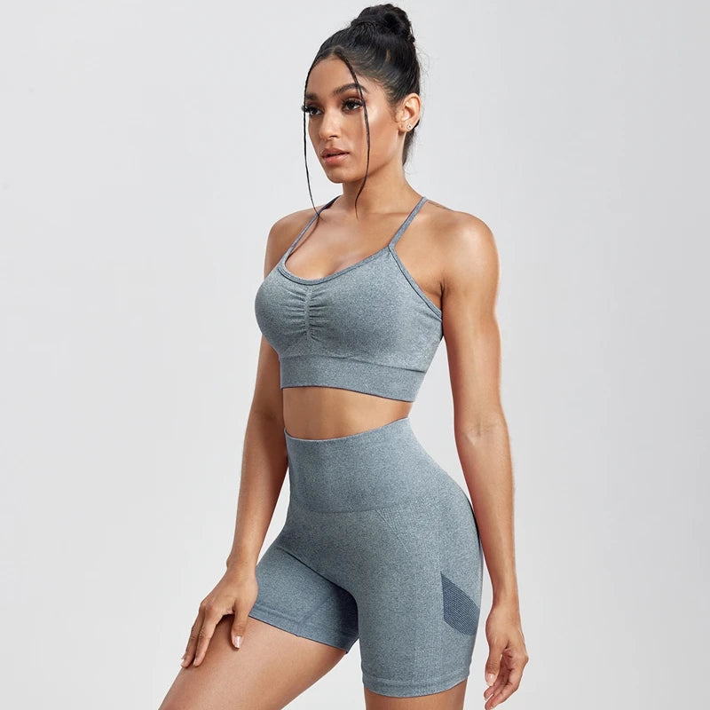 Conjuntos de dos piezas lisos para mujer, pantalones cortos con glúteos de melocotón, conjunto de gimnasio para mujer, pantalones cortos de Fitness con cuello Halter, sujetador de realce para verano