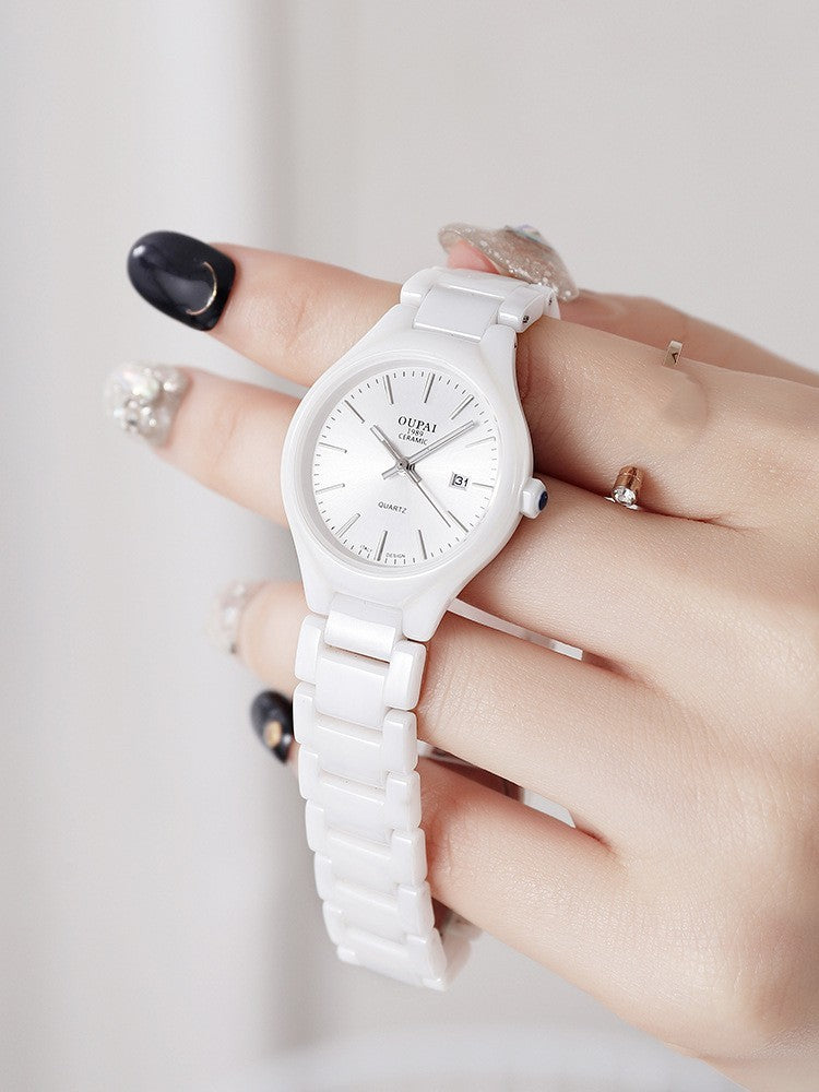 Reloj de mujer de cerámica blanca con temperamento simple.